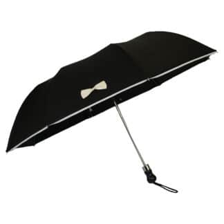 Voir le produit Parapluie pliant noir petit noeud blanc du marchand H2o Parapluies - Chapeaux & Parapluies